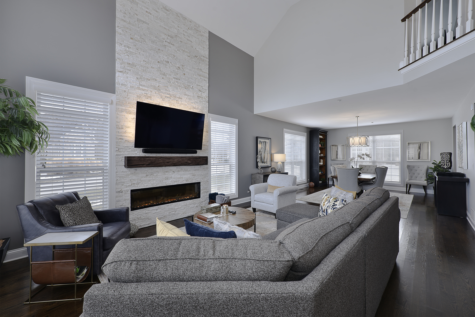 500 Stone Canyon Circle Inverness, IL 60010 - Photo 4 of 33 a living room with furniture a fireplace and a flat screen tv