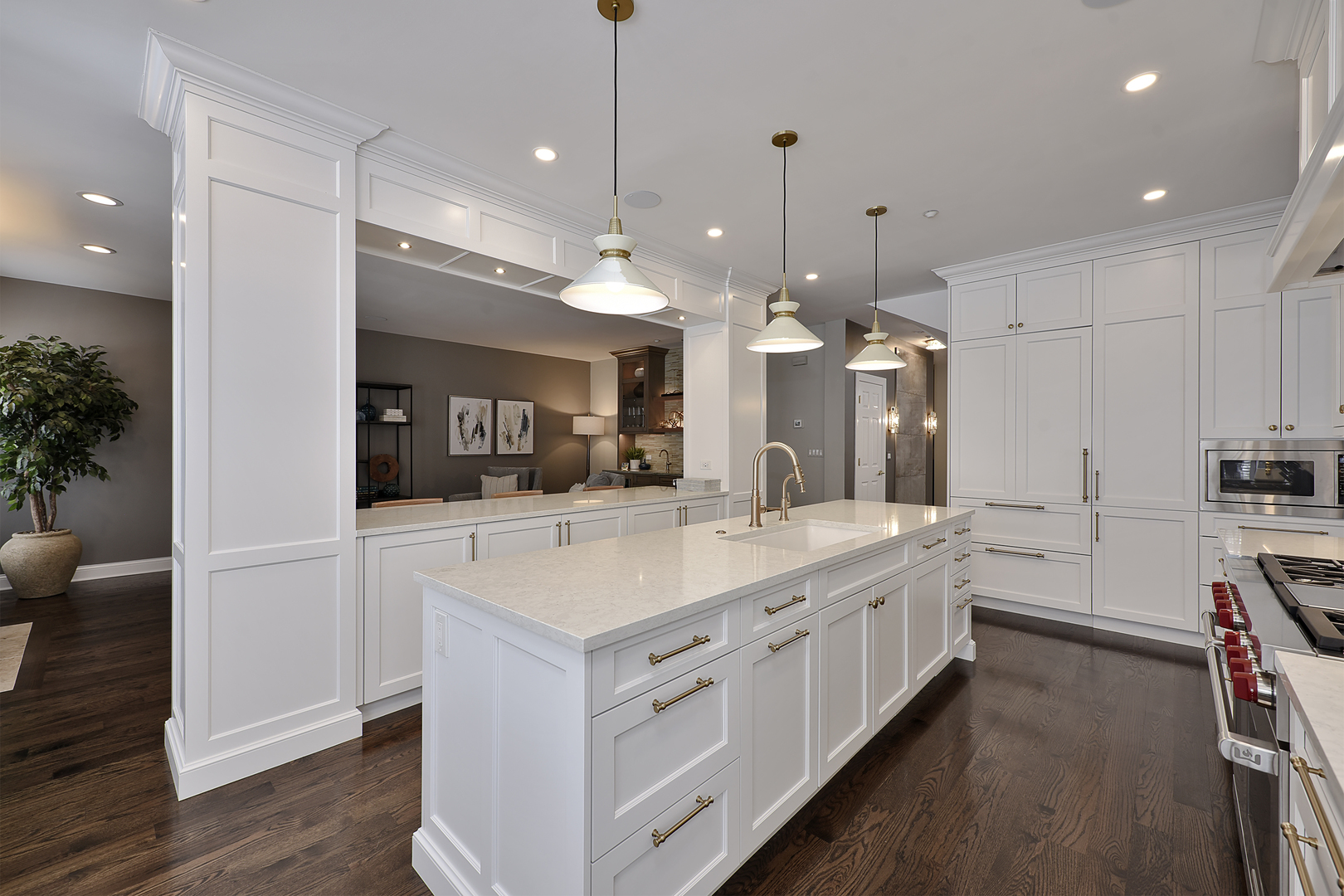 500 Stone Canyon Circle Inverness, IL 60010 - Photo 6 of 33 a large white kitchen with a large island oven a stove a table and chairs