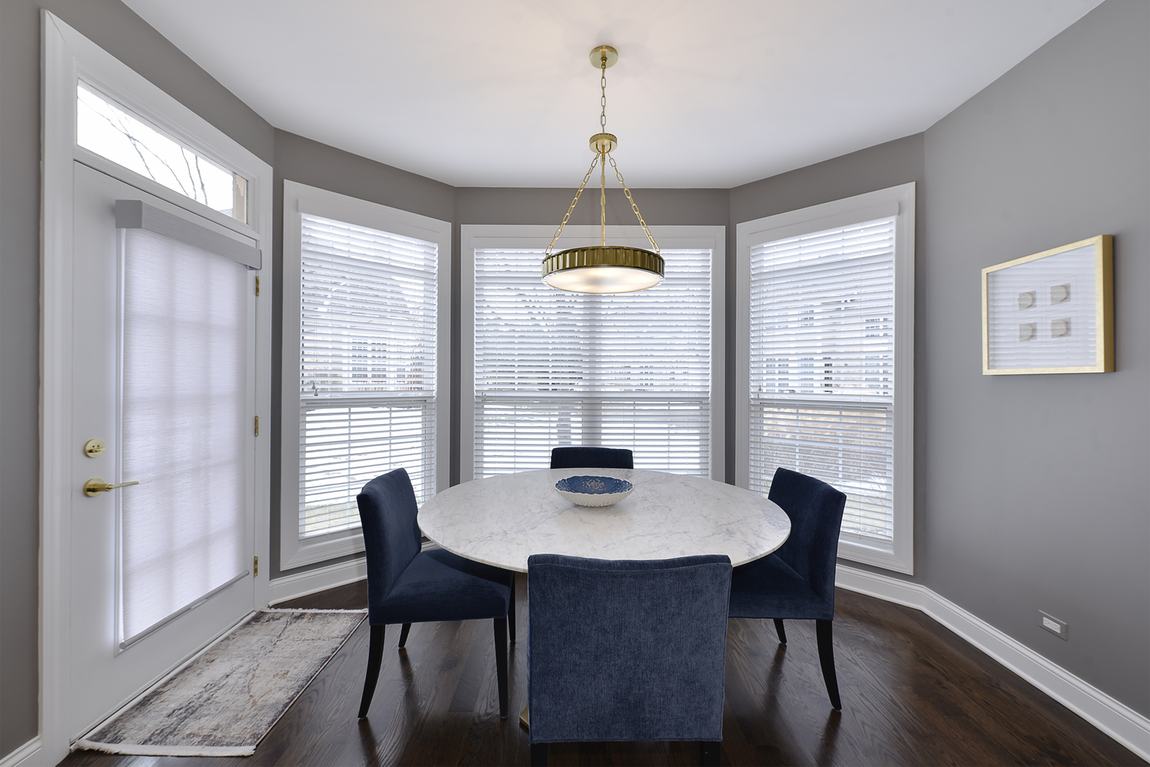500 Stone Canyon Circle Inverness, IL 60010 - Photo 10 of 33 a dining room with furniture a chandelier and wooden floor