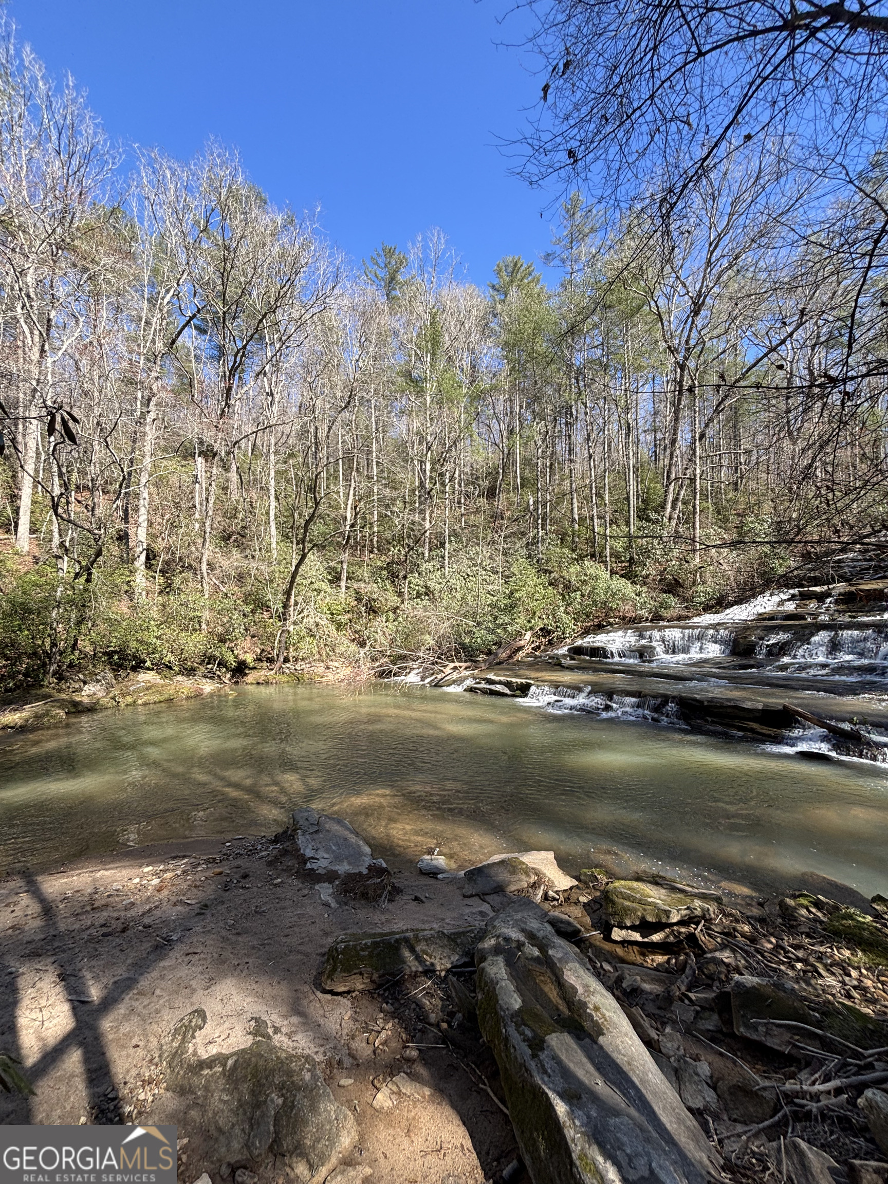 0 Waterfall Drive, Unit 9 Cleveland, GA 30528 - Photo 8 of 11 a view of a lake with houses