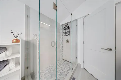 a view of sitting area with furniture and wooden floor