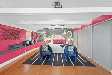 a bathroom with a toilet a sink and shower