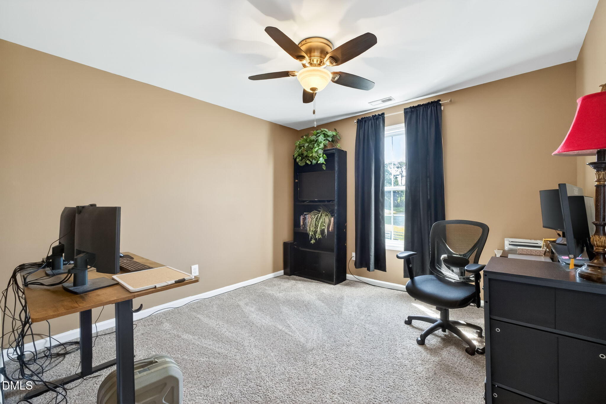 923 White Memorial Church Road Willow Spring, NC 27592 - Photo 28 of 46 a workspace with furniture and a window