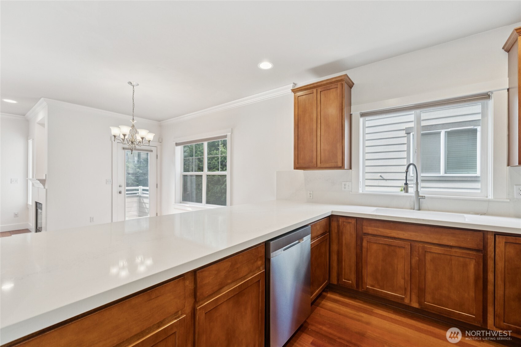 9503 Ashworth Avenue North, Unit B Seattle, WA 98103 - Photo 9 of 26 a kitchen with sink and window