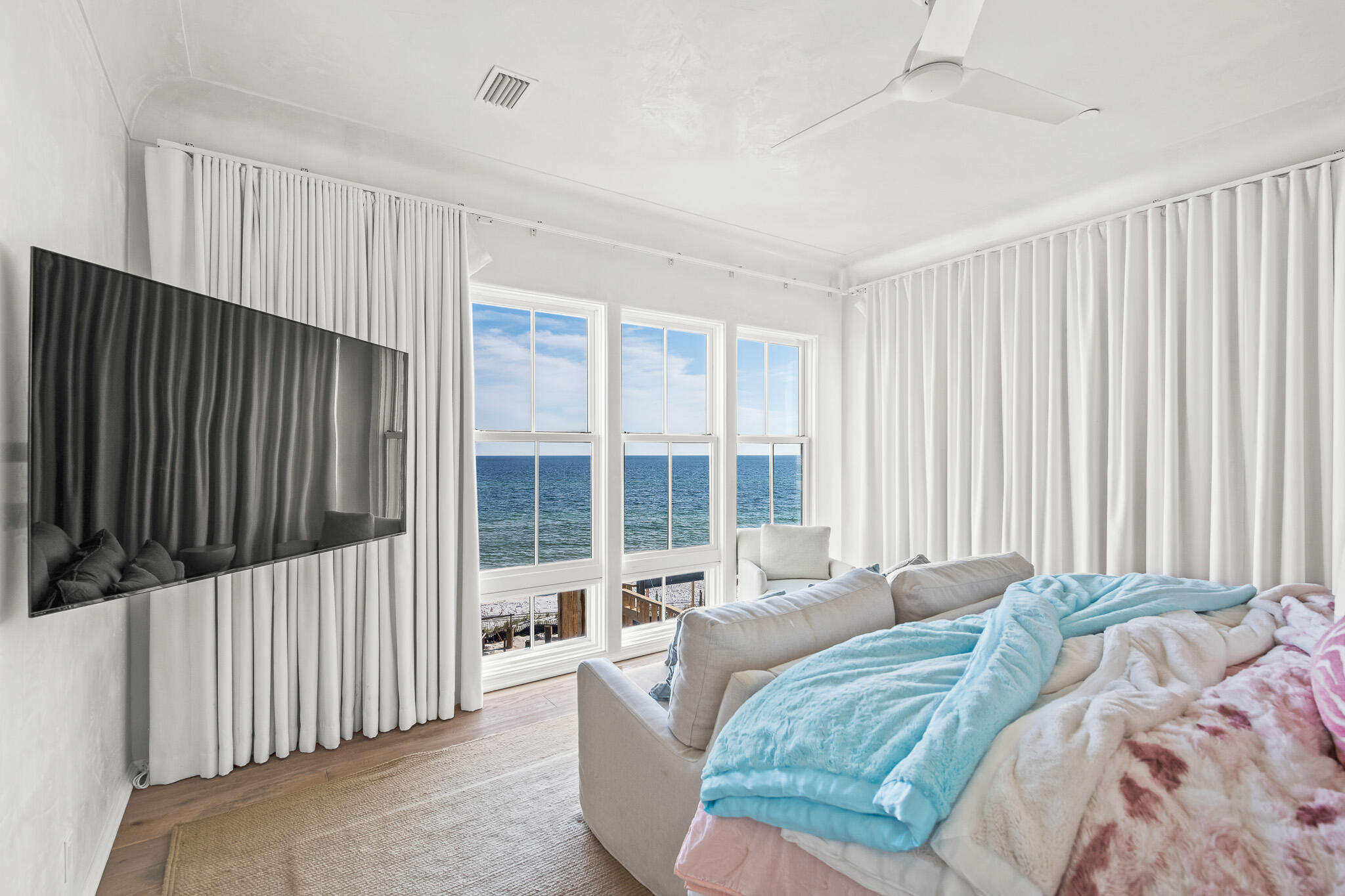 281 Pompano Street Inlet Beach, FL 32461 - Photo 33 of 49 a bed sitting in a bedroom next to a window