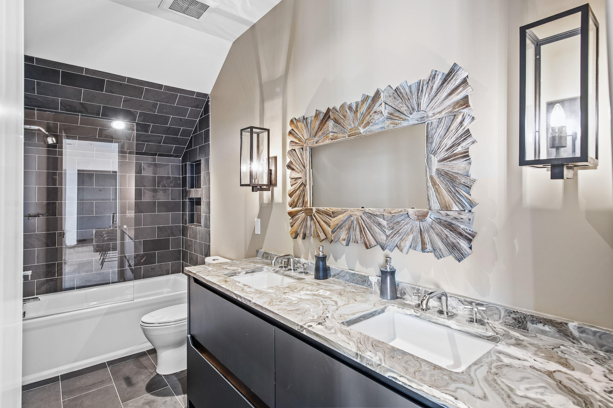 281 Pompano Street Inlet Beach, FL 32461 - Photo 38 of 49 a bathroom with a granite countertop sink a toilet and shower