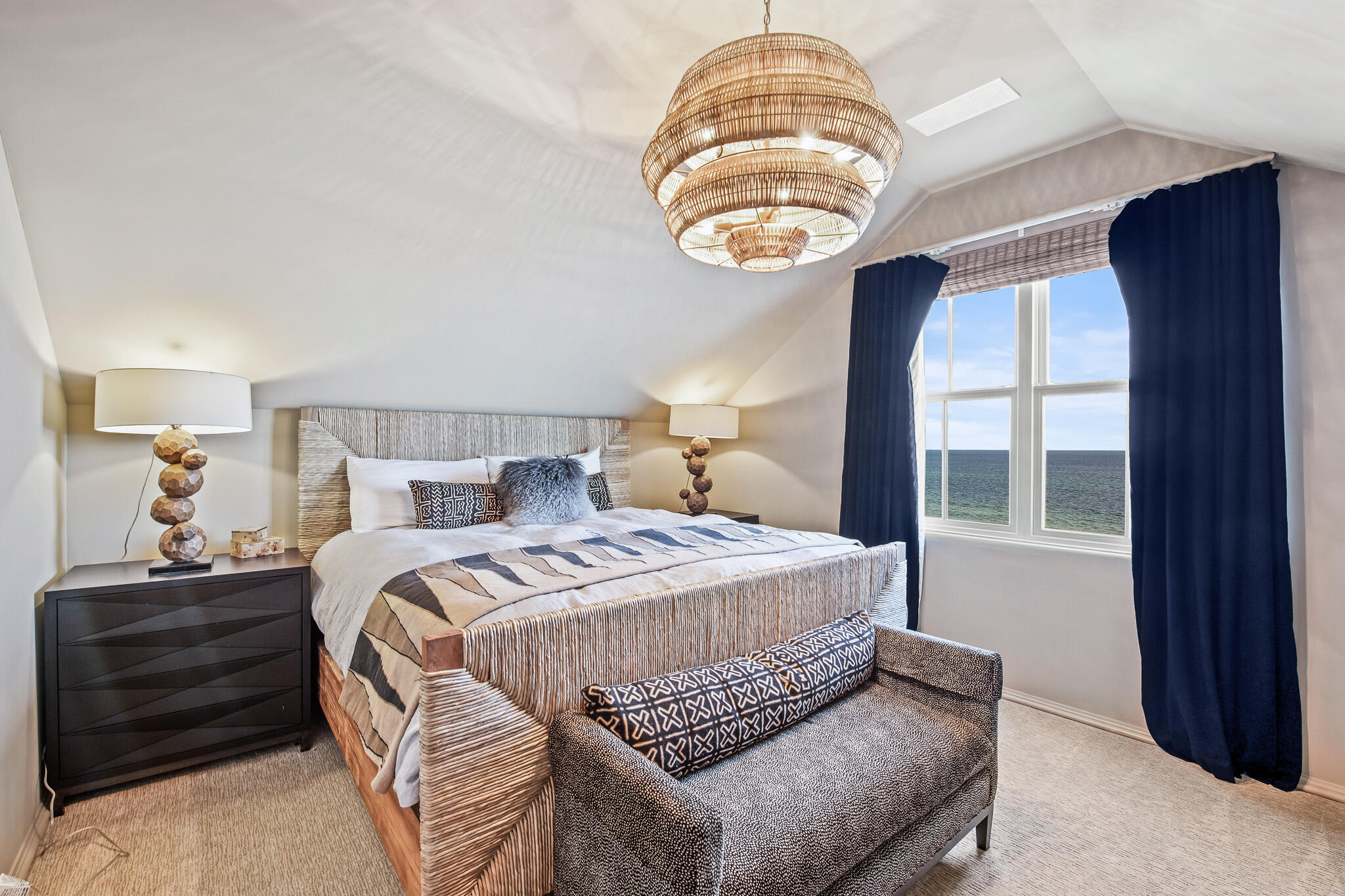 281 Pompano Street Inlet Beach, FL 32461 - Photo 41 of 49 a bedroom with a bed and a chandelier