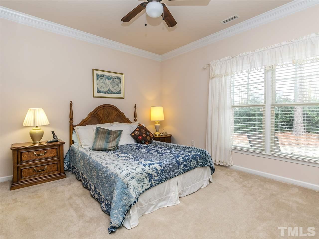 8109 Satillo Lane Raleigh, NC 27616 - Photo 11 of 25 Such a rare find - a first floor master with a good sized walk in closet. Situated at the rear of the home for lots of privacy.