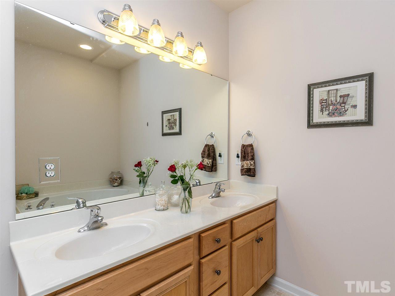 8109 Satillo Lane Raleigh, NC 27616 - Photo 12 of 25 Double vanity! Loads of cabinet space for storage!