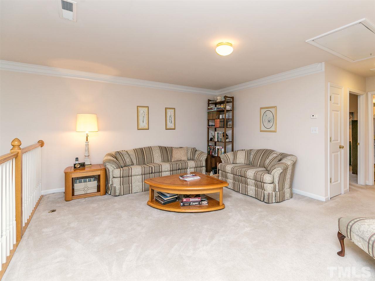 8109 Satillo Lane Raleigh, NC 27616 - Photo 14 of 25 Hard to believe that all this living space hides in this home! This huge loft offers another who living area, perfect for a playroom, pool table or a less formal living area.