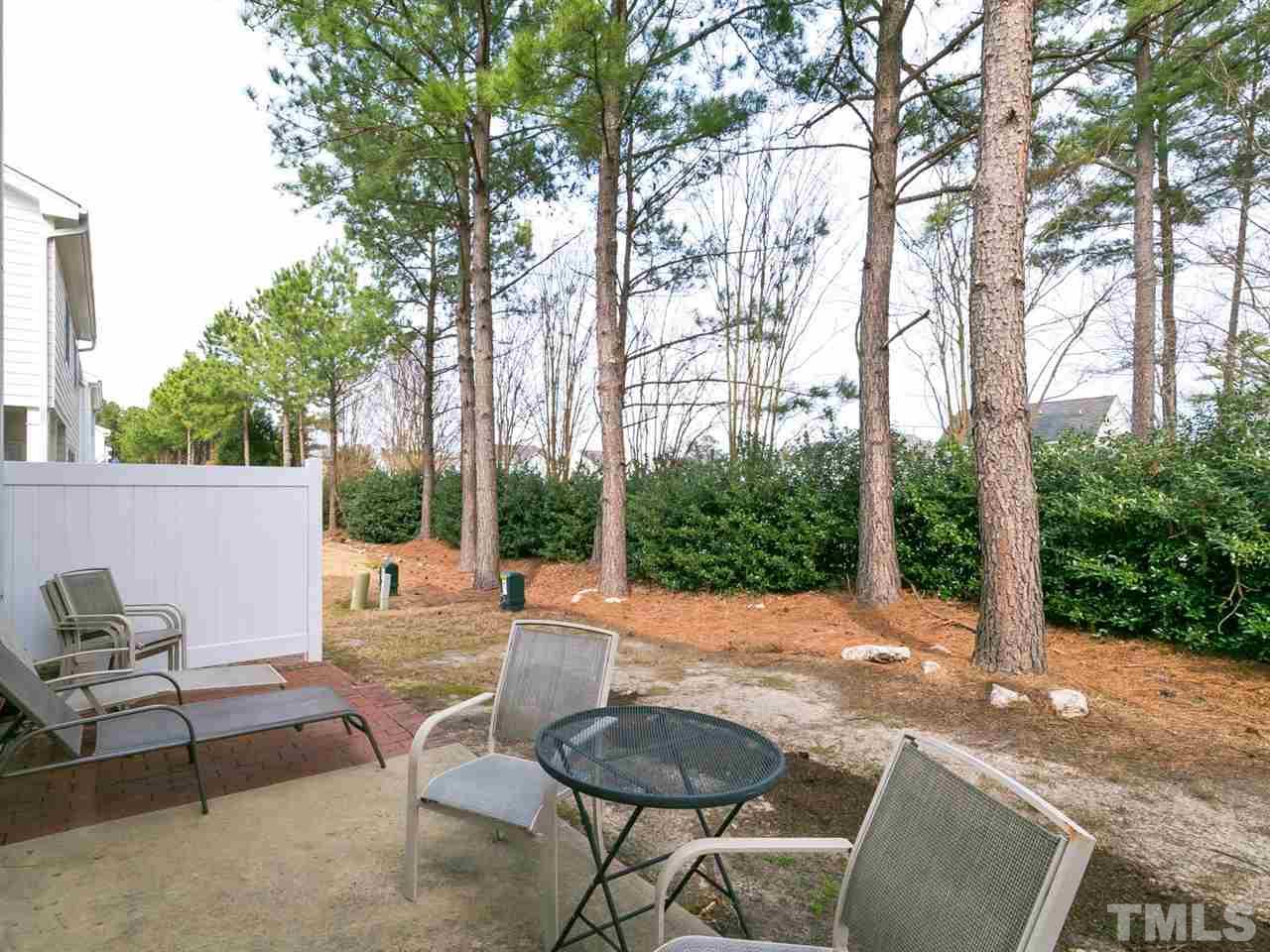 8109 Satillo Lane Raleigh, NC 27616 - Photo 21 of 25 Because this is an end unit there's good privacy in the patio area.