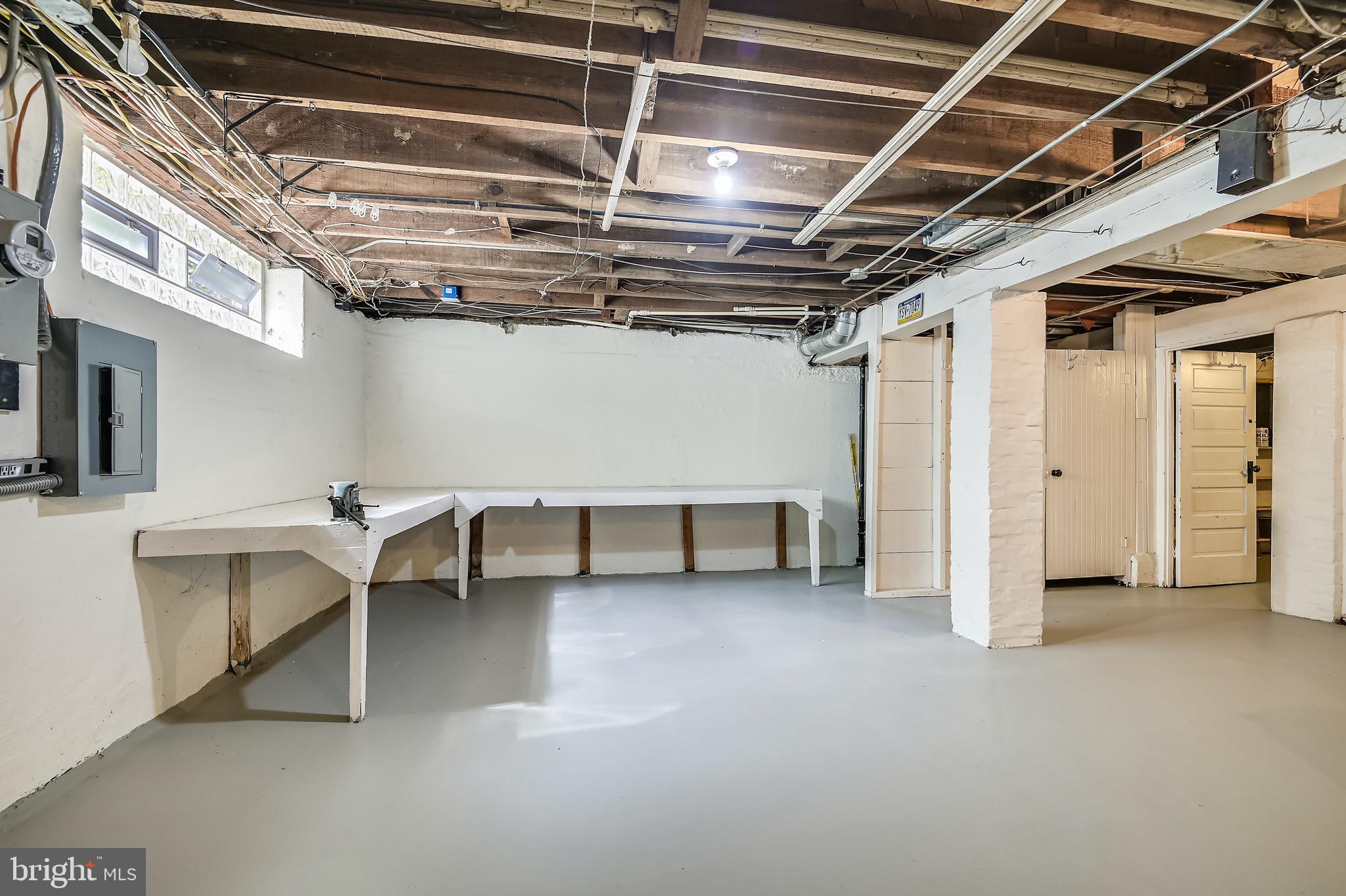 311 St Dunstans Road Baltimore, MD 21212 - Photo 49 of 67 Workbench, sink & storage; outside access
