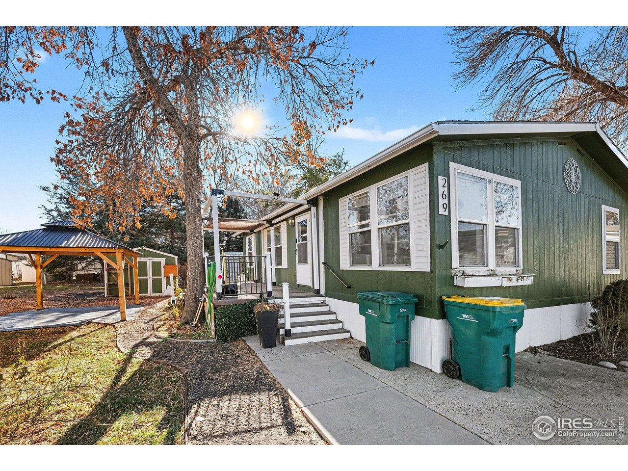 2500 East Harmony Road, Unit 269 Fort Collins, CO 80528 - Photo 21 of 22 a view of a house with backyard and sitting area