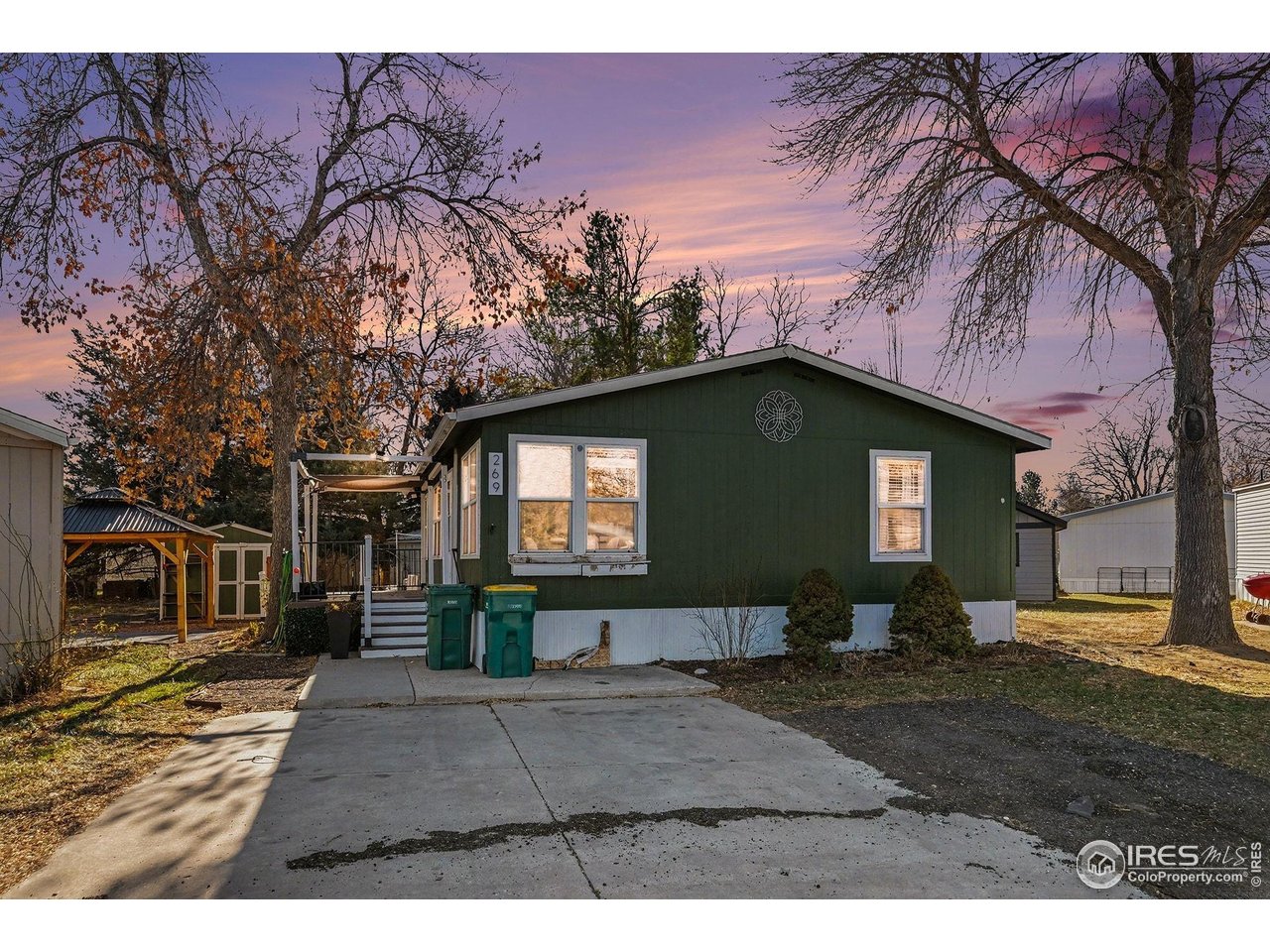 2500 East Harmony Road, Unit 269 Fort Collins, CO 80528 - Photo 22 of 22 a front view of a house with garden