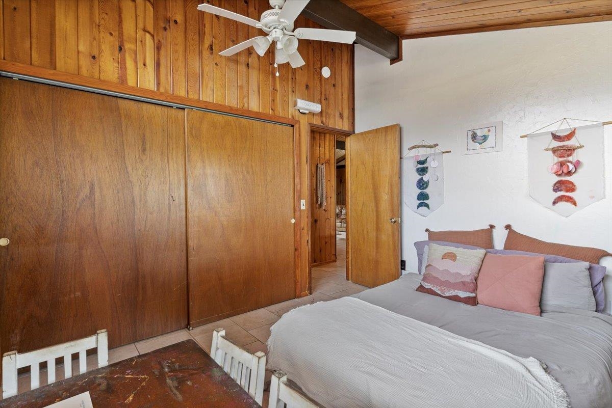 11 Keola Place Makawao, HI 96768 - Photo 23 of 45 a bedroom with a bed and a table