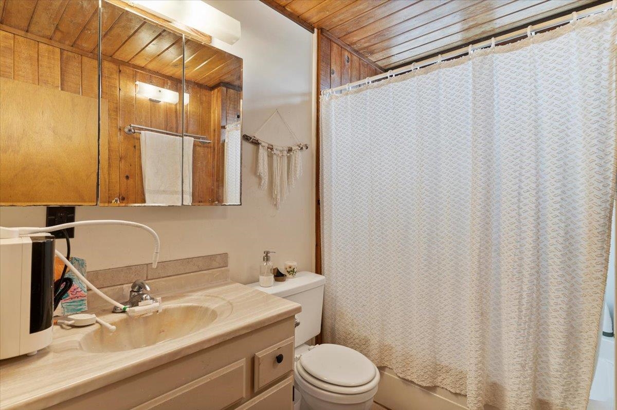 11 Keola Place Makawao, HI 96768 - Photo 26 of 45 a bathroom with a sink a toilet and shower