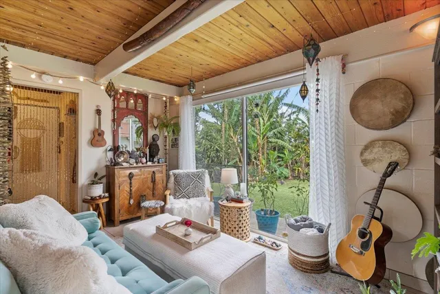 a outdoor living space with furniture and garden view