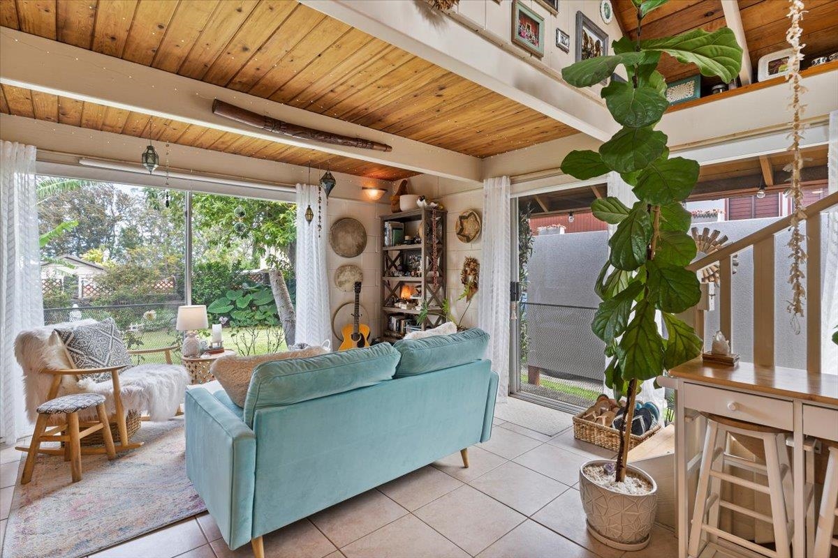 11 Keola Place Makawao, HI 96768 - Photo 34 of 45 a living room with furniture and a potted plant