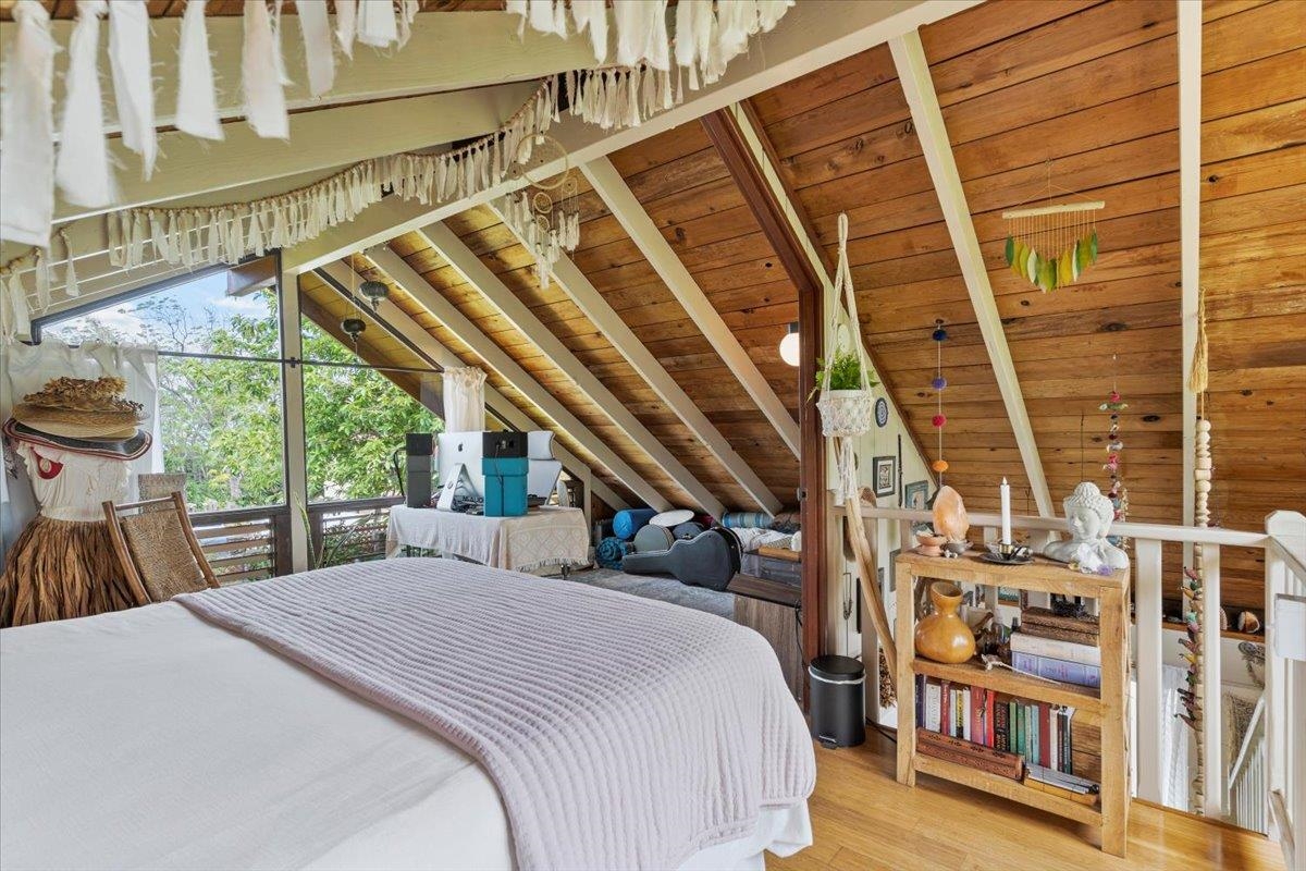 11 Keola Place Makawao, HI 96768 - Photo 38 of 45 a bedroom with a bed next to a window