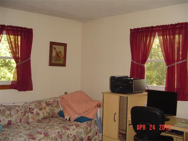 30 Morton Road Freetown, MA 02717 - Photo 7 of 12 a bedroom with a bed and window