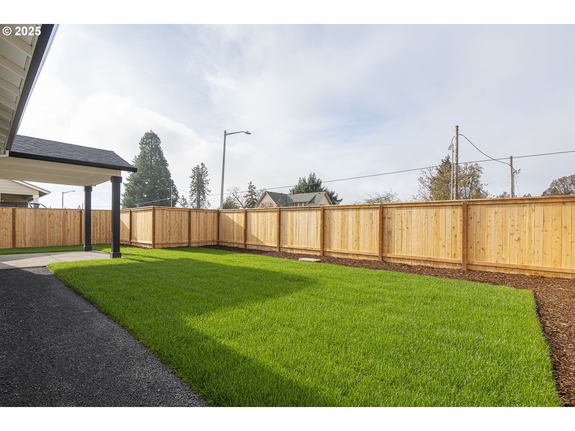 665 Parker Loop Silverton, OR 97381 - Photo 35 of 38 a view of a house with a yard and outdoor seating