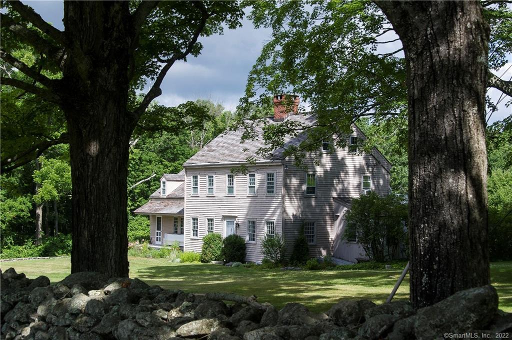 Gorgeous secluded setting for this 1780 antique home