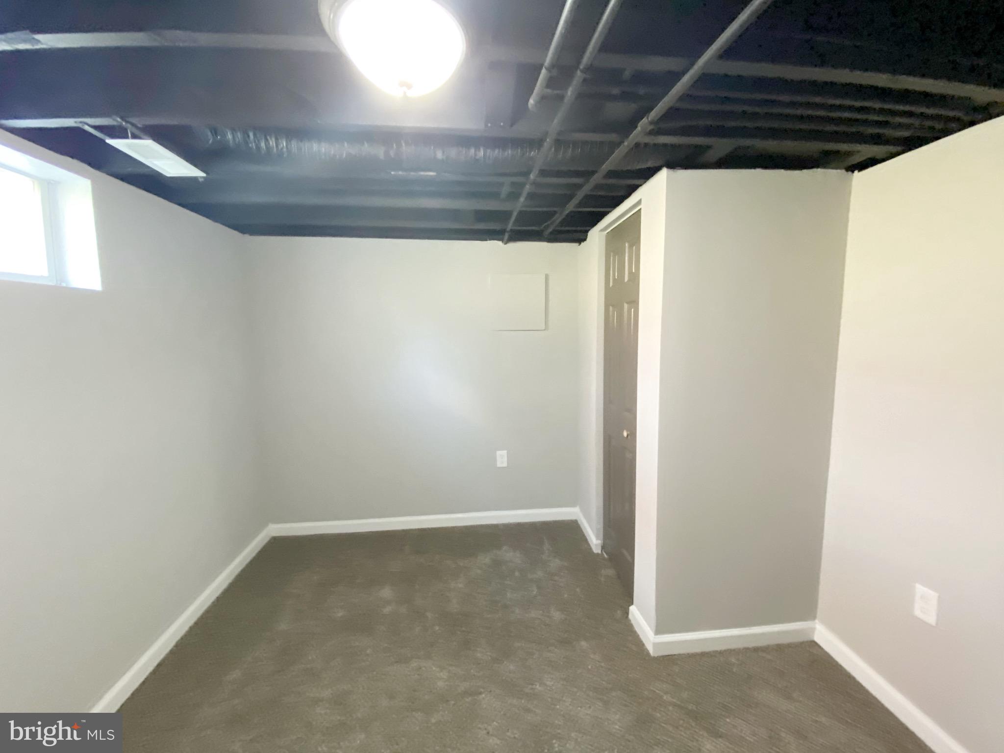 708 Devonshire Road Baltimore, MD 21229 - Photo 15 of 20 Basement bedroom