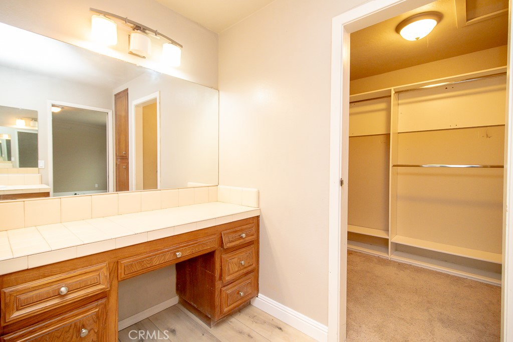 20376 Tonawanda Road Apple Valley, CA 92307 - Photo 30 of 67 a bathroom with a sink and a mirror