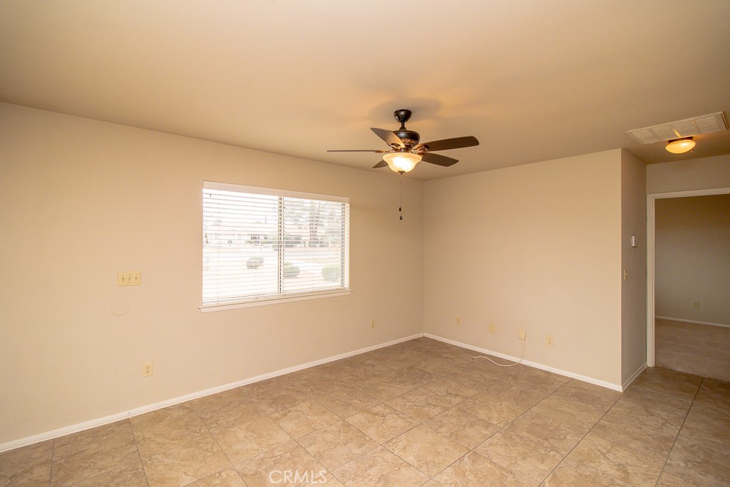 20376 Tonawanda Road Apple Valley, CA 92307 - Photo 53 of 67 an empty room with a window