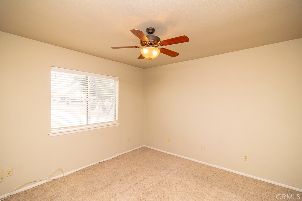 20376 Tonawanda Road Apple Valley, CA 92307 - Photo 58 of 67 a view of an empty room with a window