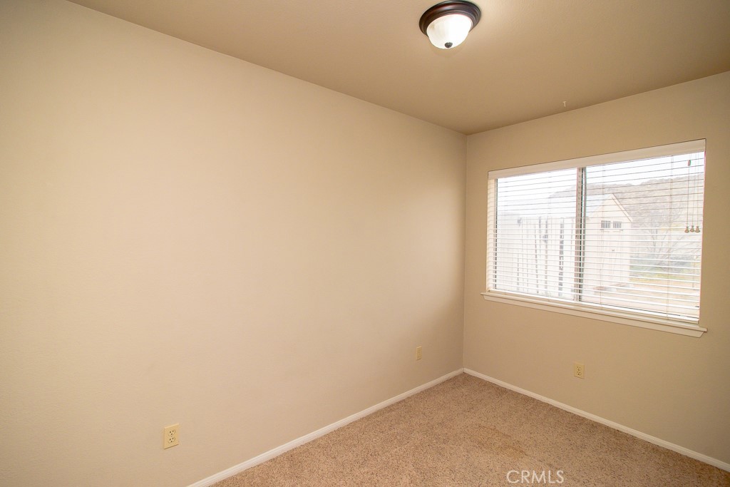 20376 Tonawanda Road Apple Valley, CA 92307 - Photo 60 of 67 an empty room with a window