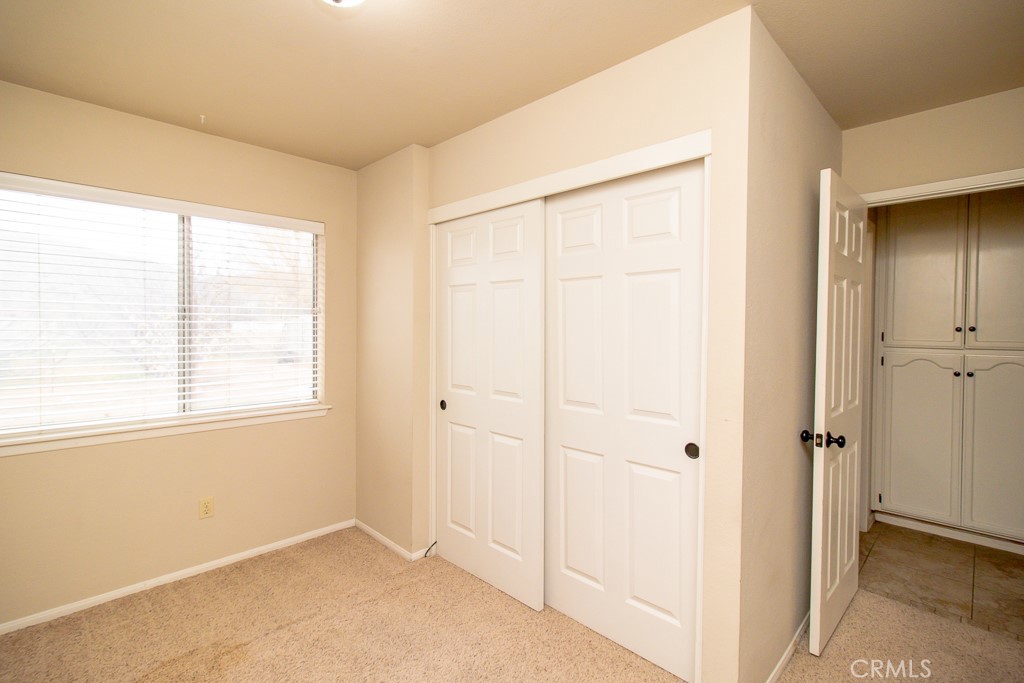 20376 Tonawanda Road Apple Valley, CA 92307 - Photo 61 of 67 a view of an empty room with a window