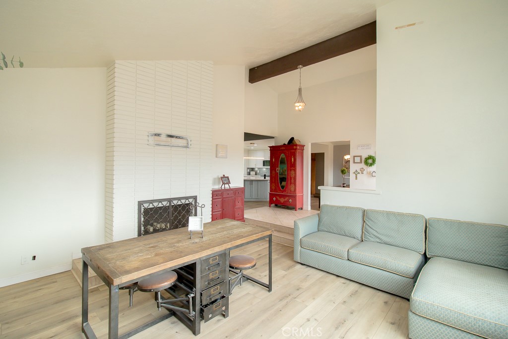 20376 Tonawanda Road Apple Valley, CA 92307 - Photo 10 of 67 a living room with furniture and a table