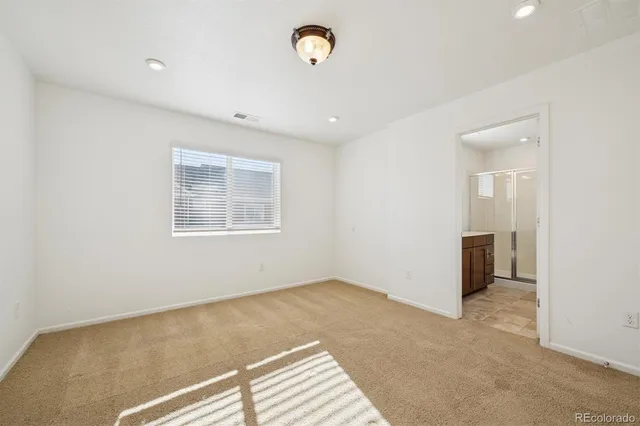 a view of utility room with closet dryer and washer