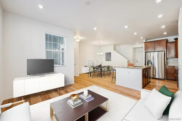 a living room with furniture and a table