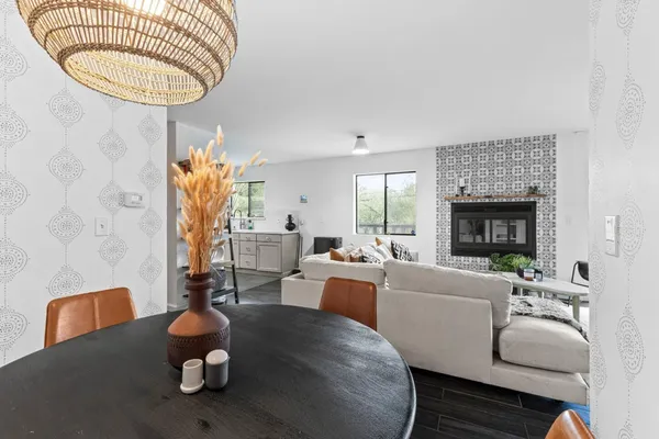 a kitchen with stainless steel appliances a refrigerator and a stove top oven