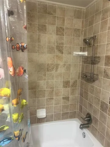 a bathroom with a bathtub