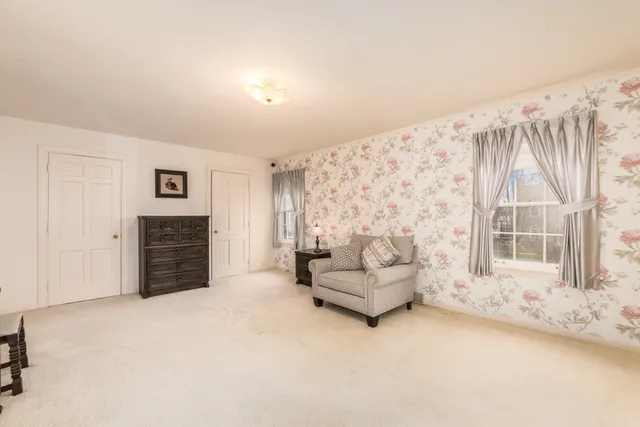 a view of livingroom with furniture and window
