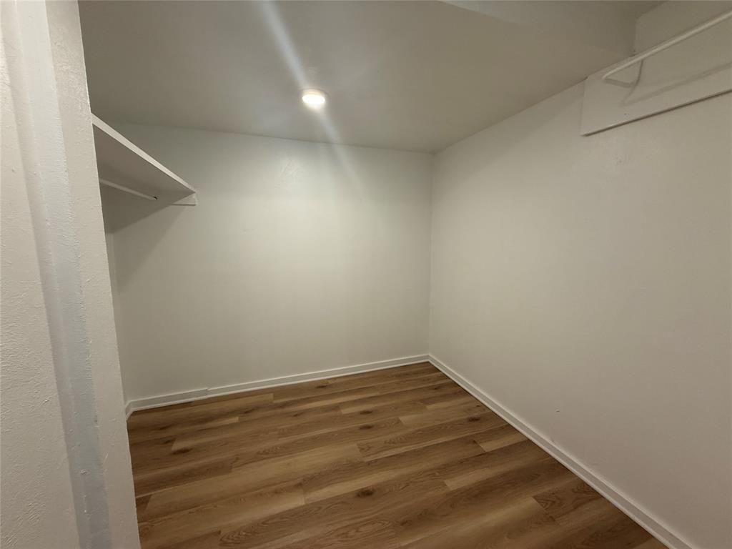 1102 Chilton Street Weatherford, TX 76086 - Photo 22 of 28 a view of small space with racks on the wall