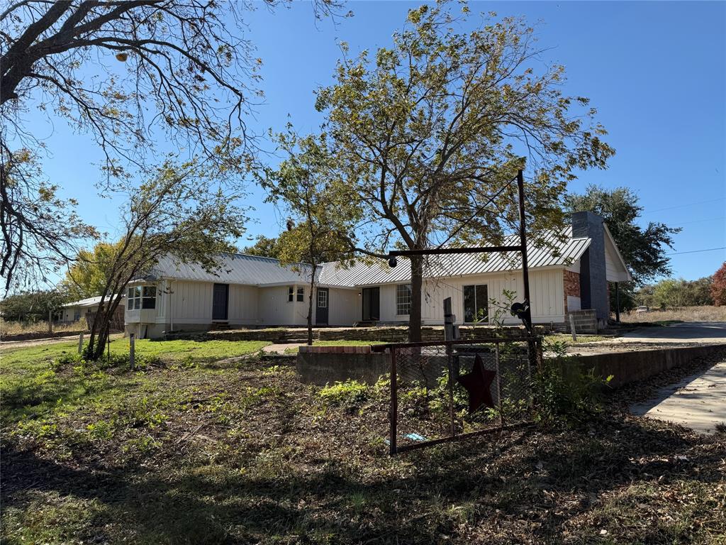 1102 Chilton Street Weatherford, TX 76086 - Photo 26 of 28 a house view with a garden space