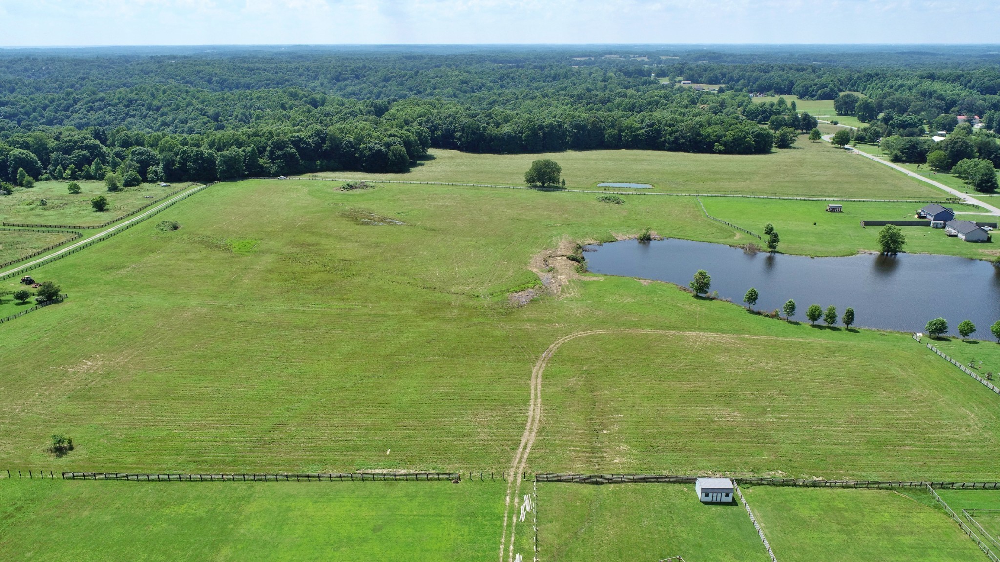 4 Gil Hodges Road Portland, TN 37148 - Photo 5 of 16 a view of a golf course with a lake