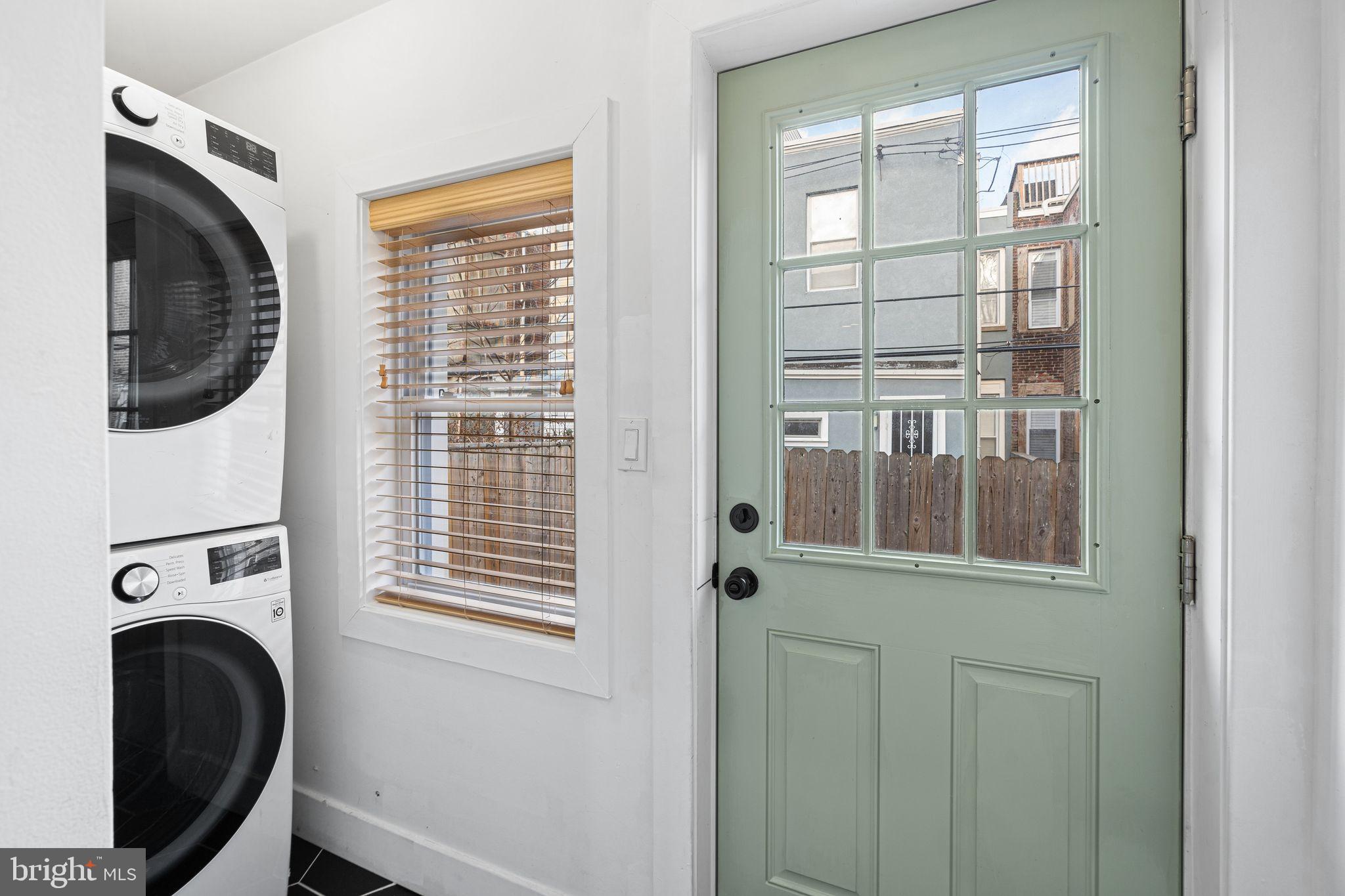 2937 Nicholas Street Philadelphia, PA 19121 - Photo 13 of 33 a view of a bedroom with washer and dryer