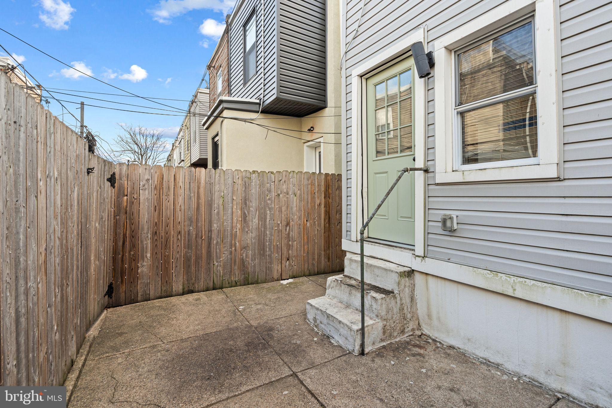2937 Nicholas Street Philadelphia, PA 19121 - Photo 14 of 33 a view of a house with a door and wooden walls
