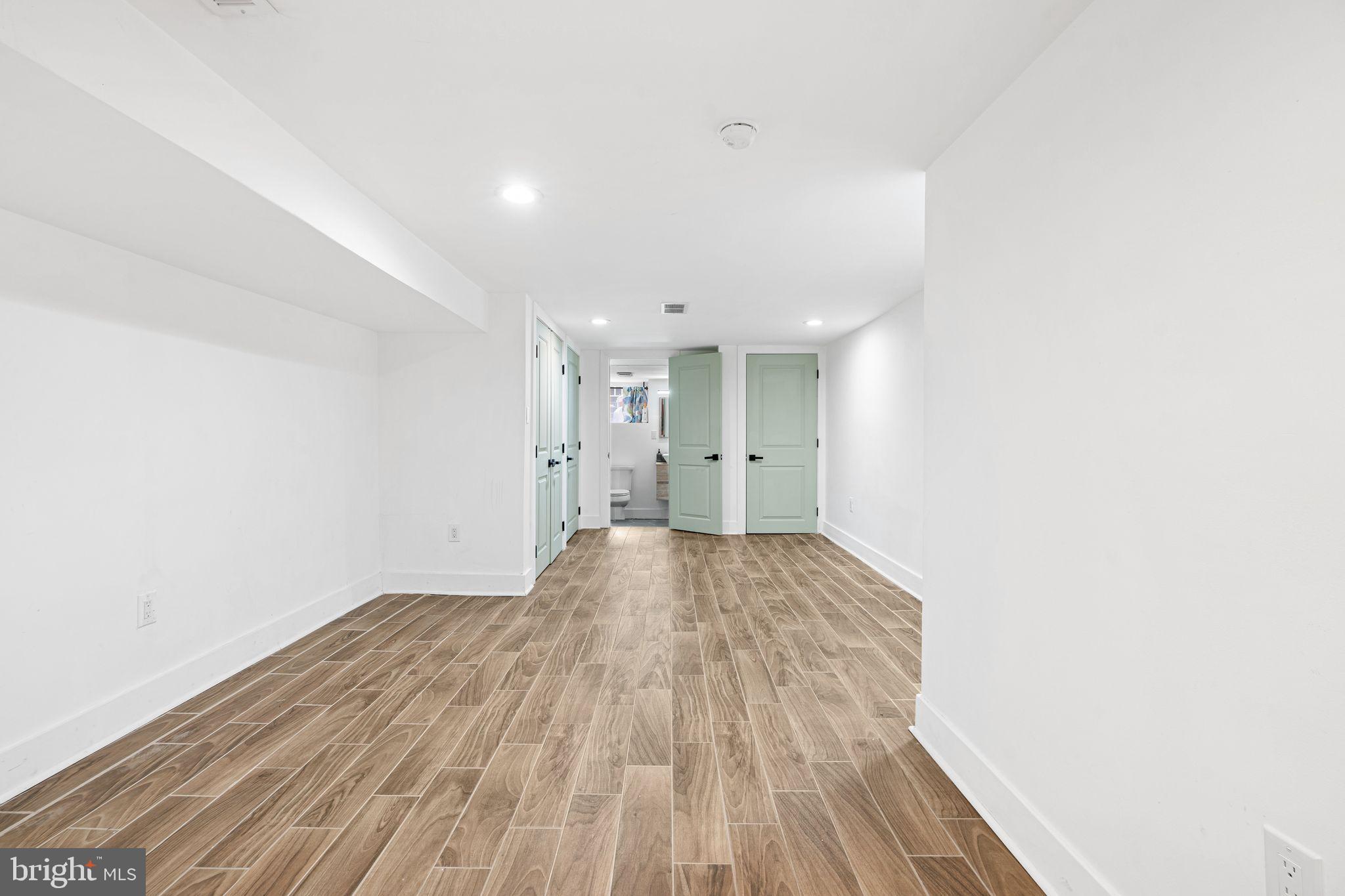 2937 Nicholas Street Philadelphia, PA 19121 - Photo 17 of 33 a view of empty room with wooden floor