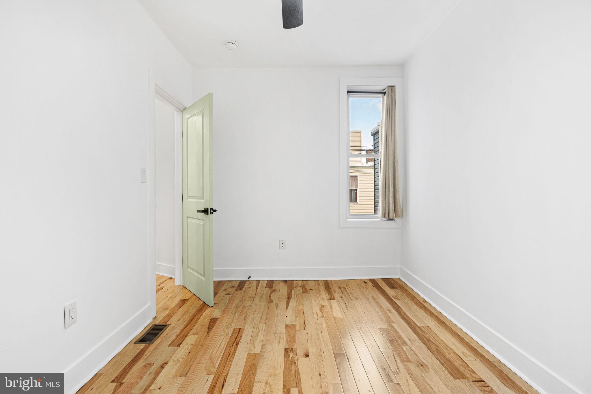 2937 Nicholas Street Philadelphia, PA 19121 - Photo 27 of 33 a view of a room with wooden floor and small space