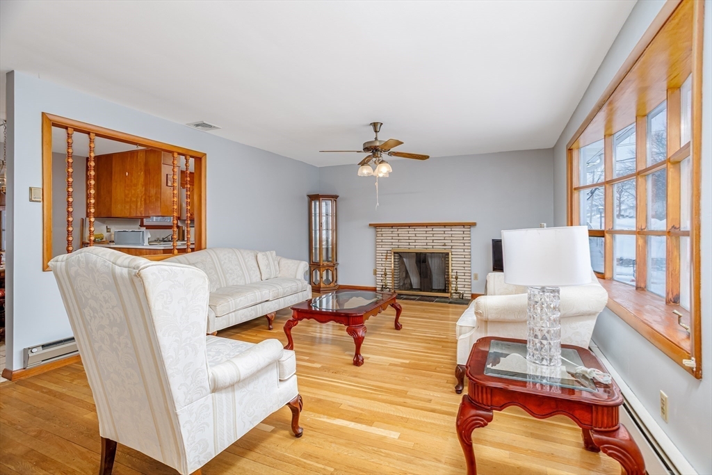 34 Robin Road Worcester, MA 01604 - Photo 12 of 42 a living room with furniture fireplace and a fireplace