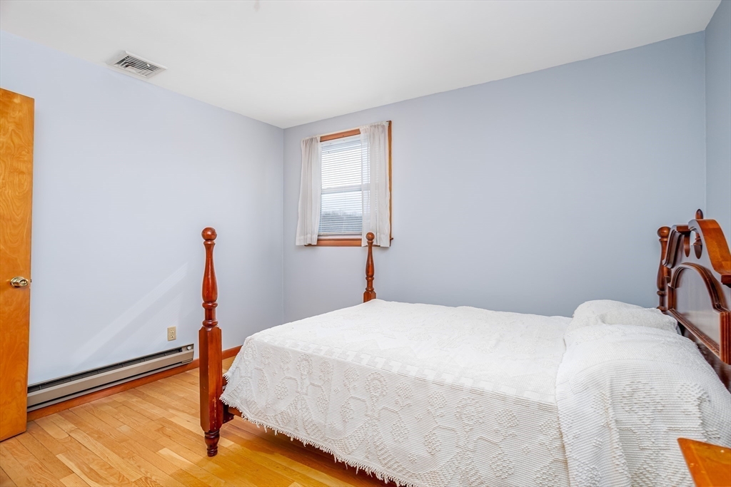 34 Robin Road Worcester, MA 01604 - Photo 21 of 42 a bedroom with a bed and a window