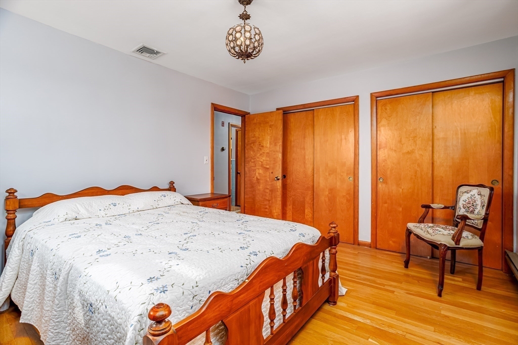 34 Robin Road Worcester, MA 01604 - Photo 24 of 42 a bedroom with a bed and a window