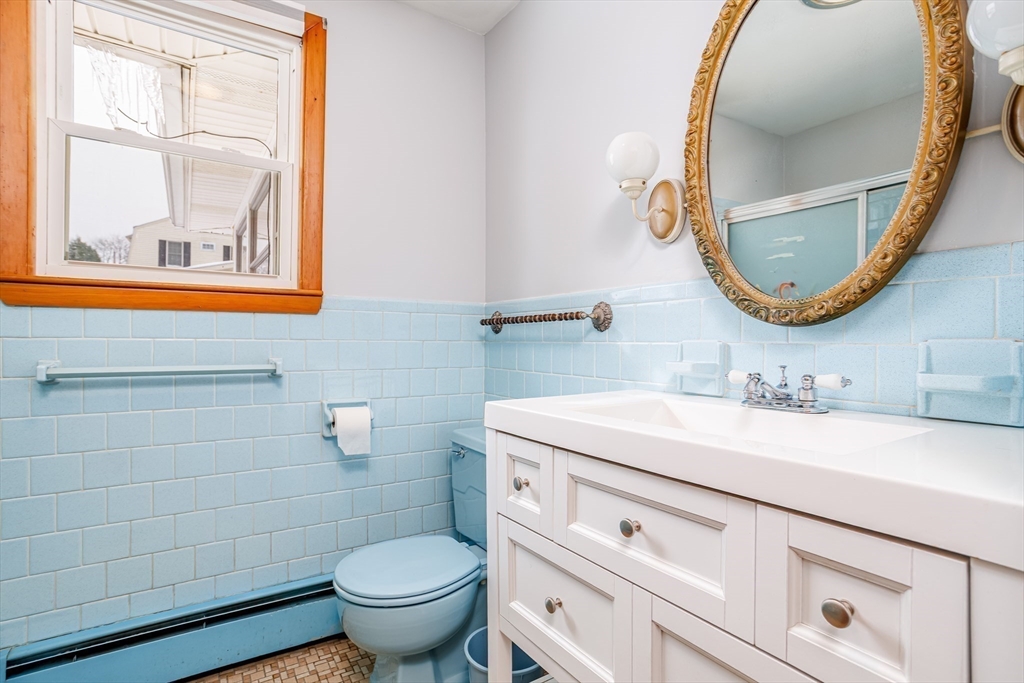 34 Robin Road Worcester, MA 01604 - Photo 26 of 42 a bathroom with a sink and a mirror