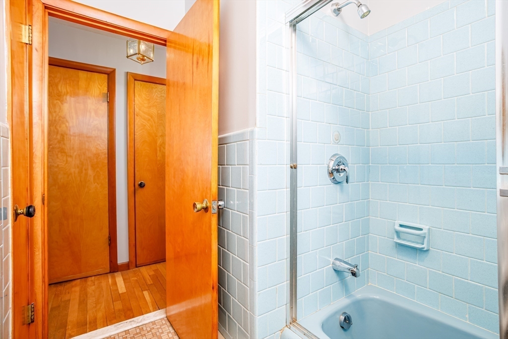 34 Robin Road Worcester, MA 01604 - Photo 27 of 42 a bathroom with a tub and shower